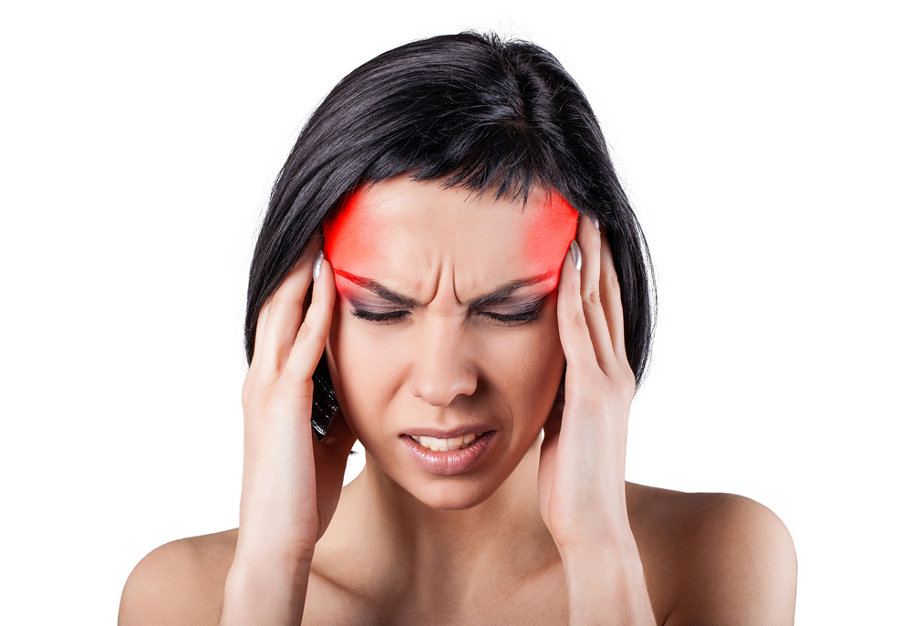 woman suffering from a terrible migraine